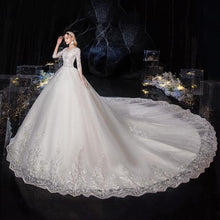 Load image into Gallery viewer, EZKUNTZA 2020 New Sexy V Illusion Neck Half Sleeve Wdding Dress Luxury Lace Embroidery Plus Size Lace Up Princess Ball Gown
