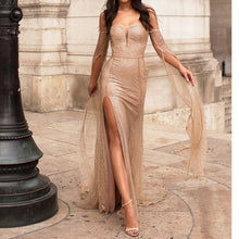 Load image into Gallery viewer, Floor Length Sleeve Celebrity Dress Hollow Out Off The Shoulder Evening Dress Split Leg Gold Glittered Boat Neck Maxi Dress
